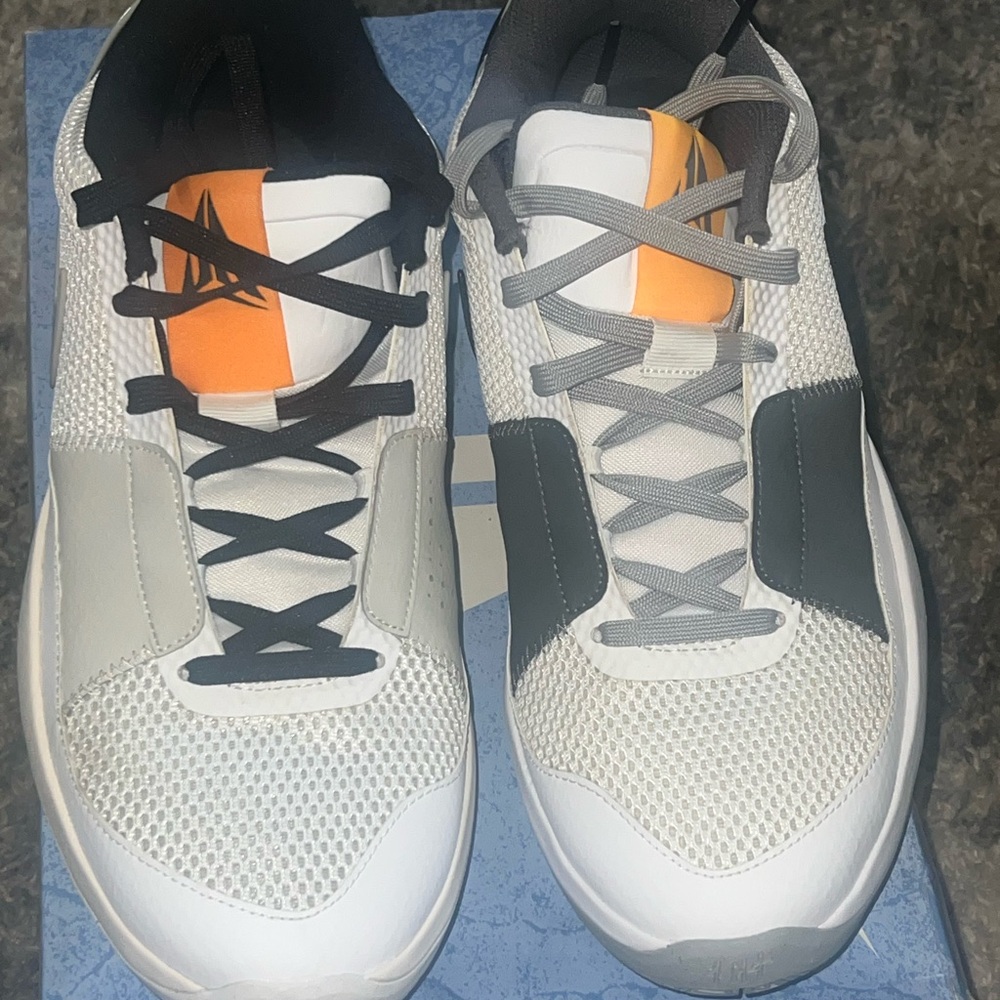 Black and White Sneakers with Orange Detail
